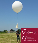 a person holds a weather balloon for Copernicus